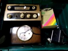 A crate containing Polaroid camera, Bentima eight day mantel clock,