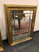 A gilt framed panel mirror,