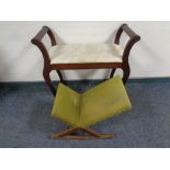 A gout stool together with a dressing table stool on shaped legs