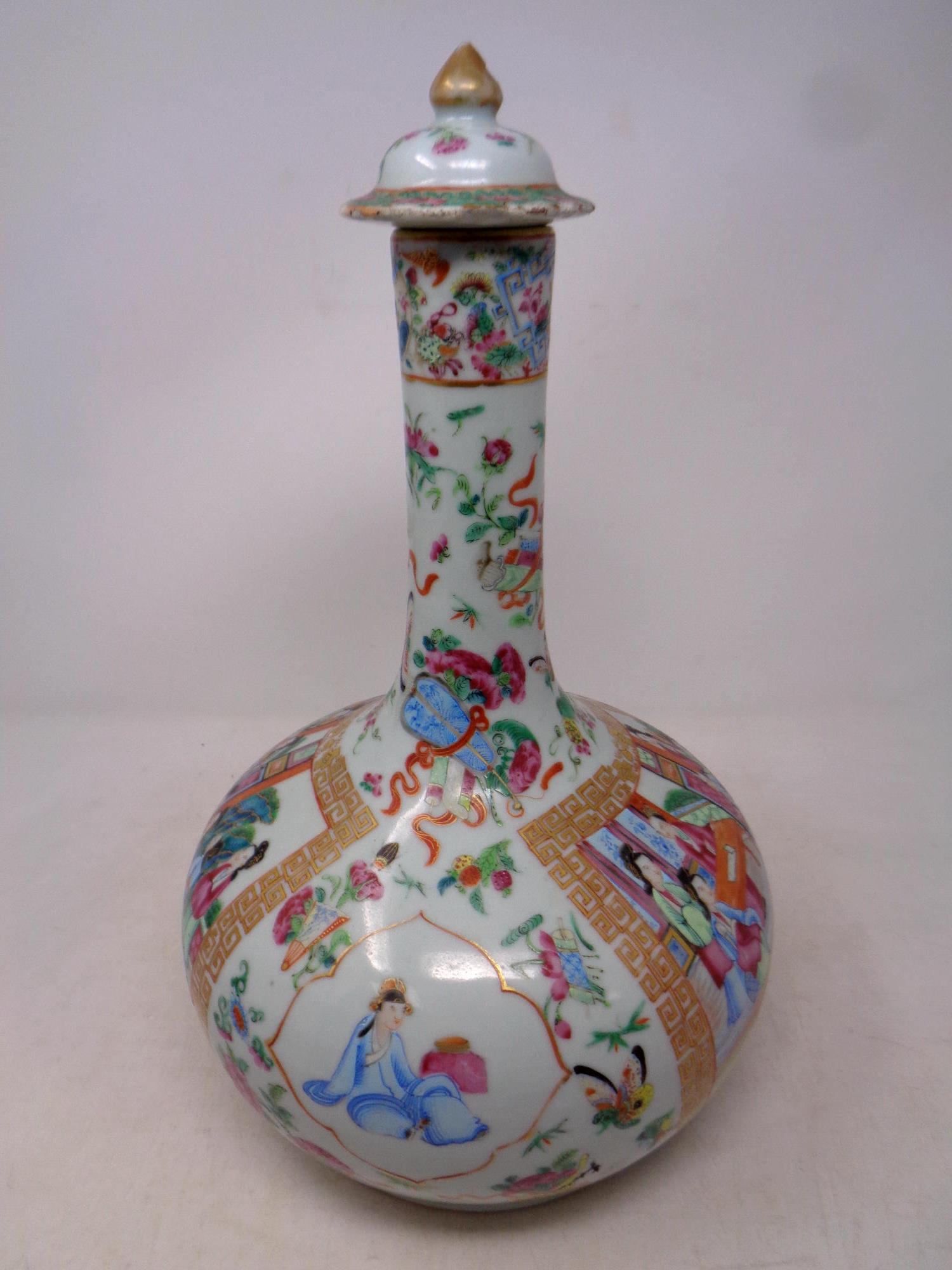 A 19th century Canton famille rose bulbous lidded vase,