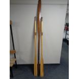 Three wooden oars