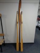 Three wooden oars
