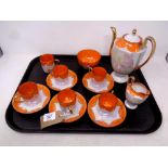 An early 20th century Phoenix ware coffee set