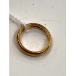 An 18ct yellow gold band ring, size G, 3.8g.