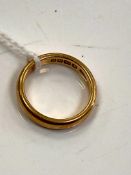 An 18ct yellow gold band ring, size G, 3.8g.