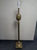 A 20th century heavy brass standard lamp on square base