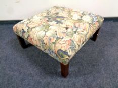 A twentieth century oversized tapestry footstool