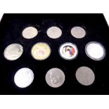 A coin collectors case containing ten coins - Crowns,