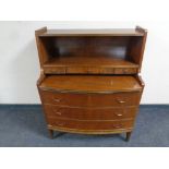 A mid 20th century walnut bow fronted writing bureau fitted slide and three drawers