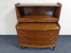 A mid 20th century walnut bow fronted writing bureau fitted slide and three drawers