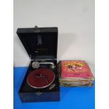 An early 20th century Colombia portable gramophone together with a quantity of 78s
