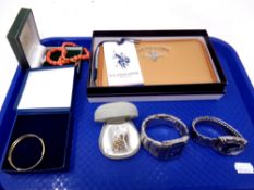 A tray containing costume jewellery, beaded necklace, baby's bangle, gent's wristwatches,