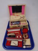 A tray containing a 20th century oriental style jewellery box containing costume jewellery,