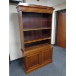 A late 19th century mahogany bookcase fitted cupboards beneath