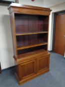 A late 19th century mahogany bookcase fitted cupboards beneath