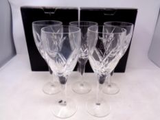A set of five Waterford Crystal John Rocha wine glasses,
