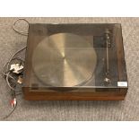 A Linn Sondek LP 12 turntable, with smoked perspex cover (complete with support arm),