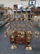 Two plated three way table candelabra's together with a vintage leather case and a metal and pine