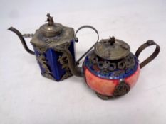 Two Chinese white metal and porcelain teapots (one with Cloisonne detail)