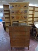 A mid 20th century five drawer chest together with a further three drawer chest
