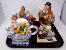 A tray containing three Ringtons collectable teapots