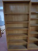 A set of mid 20th century oak open bookshelves