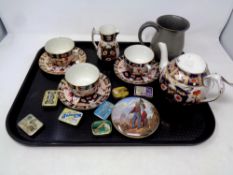 A tray of vintage needle cases, Macintyre imari style china, an antique pot lid,