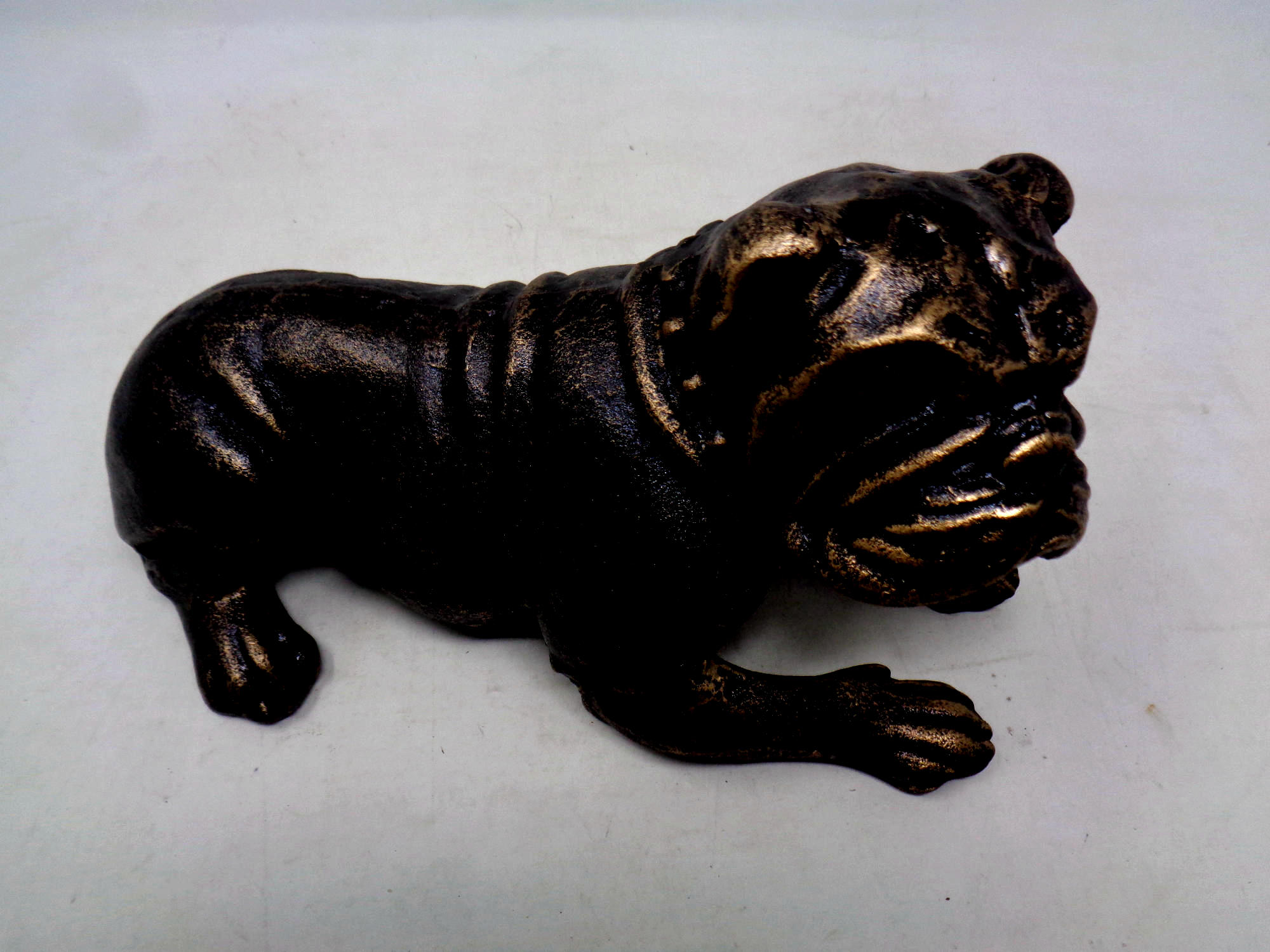 A cast iron figure of a bulldog