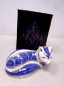 A Royal Crown Derby paperweight, Platinum Arctic Fox with gold stopper,