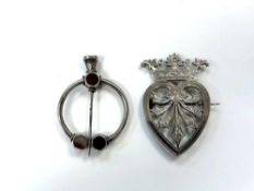 Two antique silver brooches,