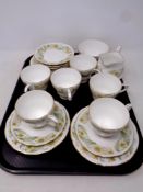 A tray containing a 20 piece Duchess Greensleeves bone china tea service