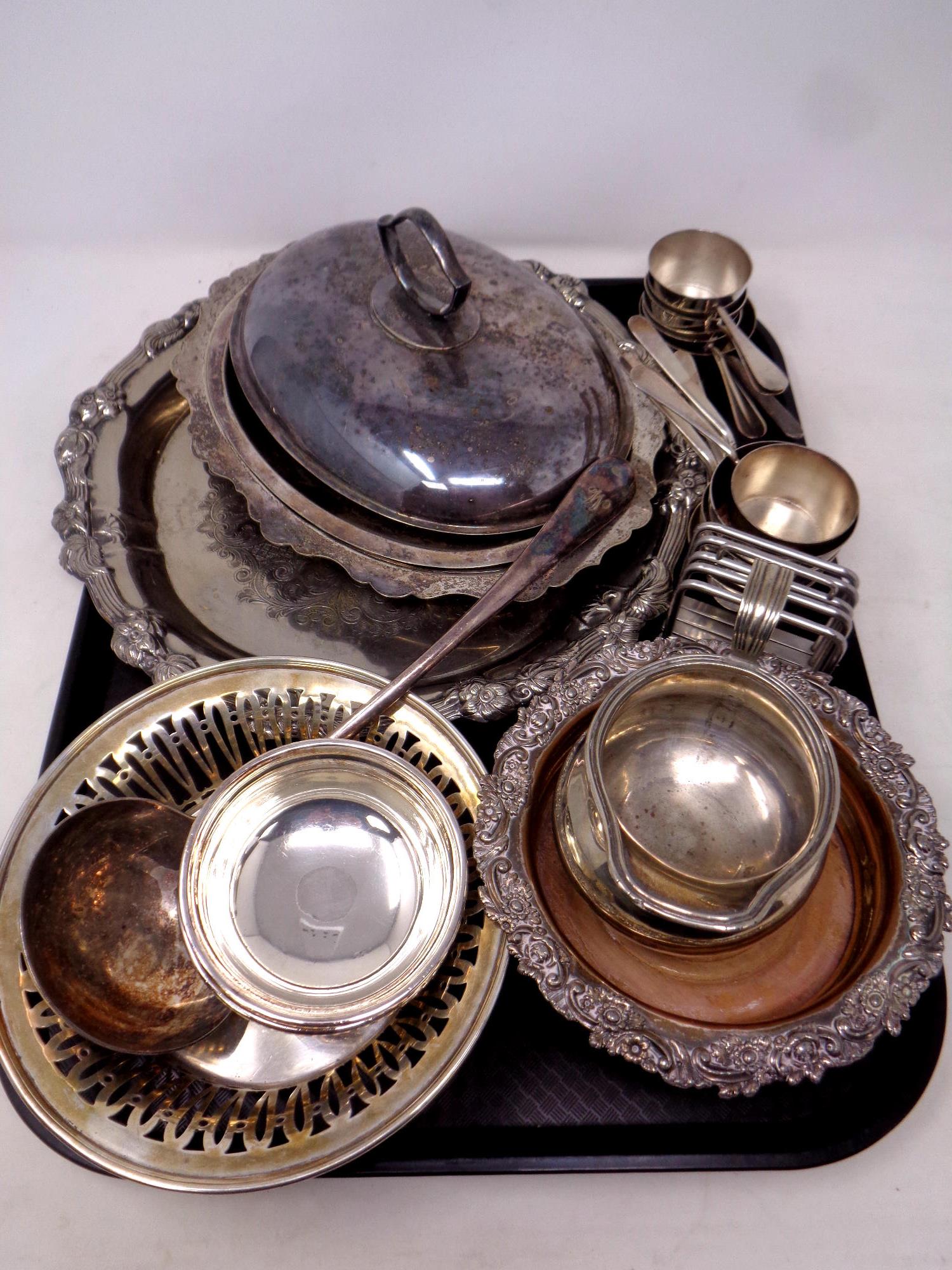A tray containing antique and later plated wares to include wine coaster, lidded tureen,