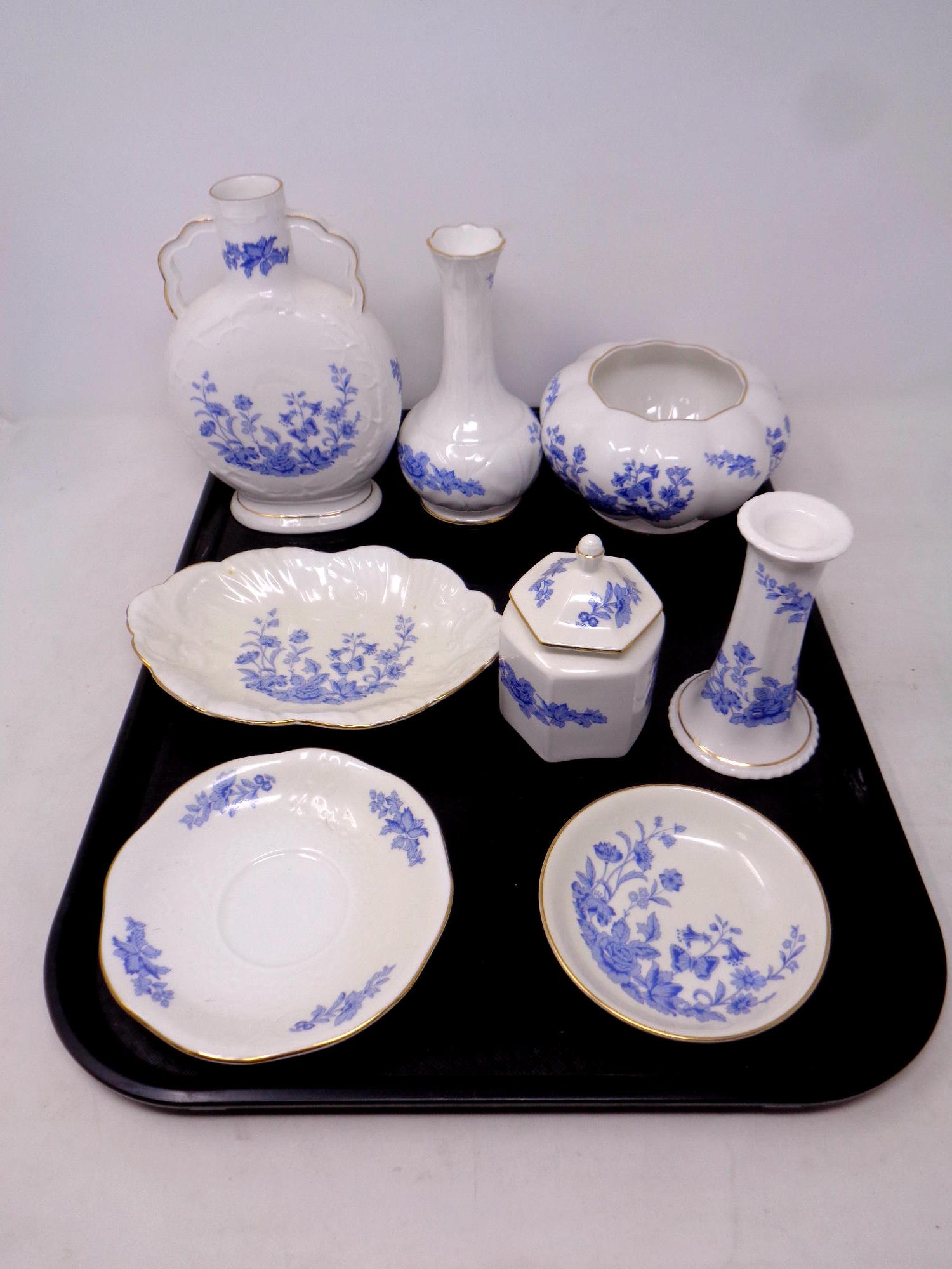 A tray containing eight pieces of Aynsley Cottage Blue cabinet china