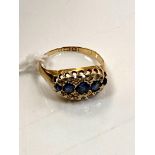An 18ct yellow gold sapphire and diamond ring, size J, 2.6g.