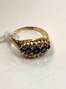 An 18ct yellow gold sapphire and diamond ring, size J, 2.6g.