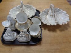 A tray containing a pair of Carlsbad cream and gilt leaf serving dishes together with three