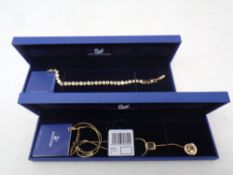 A Swarovski crystal pendant on chain together with a further Swarovski crystal bracelet (boxed)