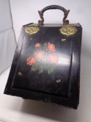 An antique hand painted tin coal receiver