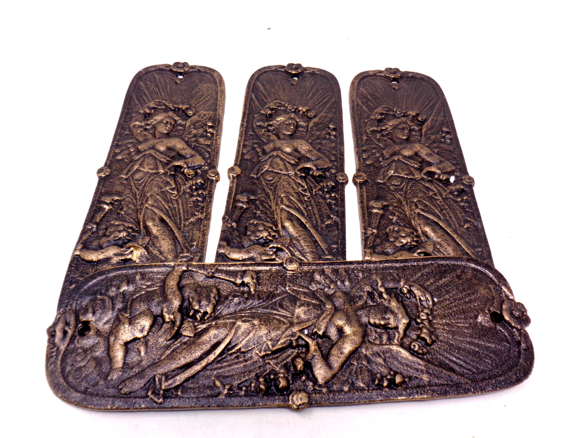 Four cast iron Art Nouveau style door finger plates