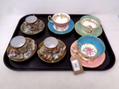 Three Aynsley hand painted china cups and saucers together with three Japanese satsuma ware cups