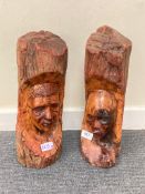 An interesting tribal hardwood carving modelled as a bearded man smoking a pipe, height 40 cm,