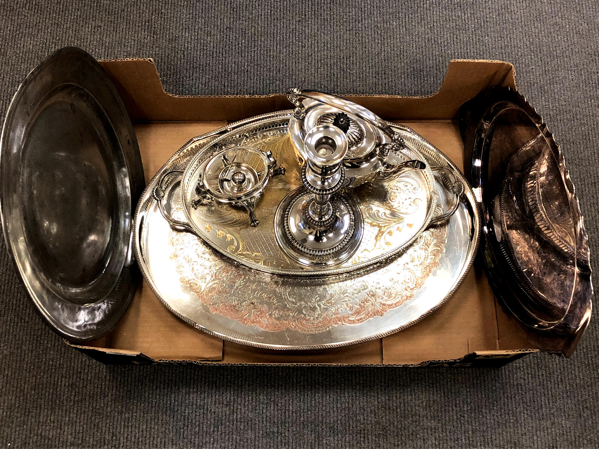 A quantity of silver plate including trays, kettle on stand with burner,