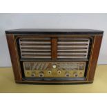 A 20th century Eltra walnut cased Air Empress 953 valve radio