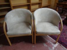 A pair of bentwood tub chairs upholstered in a suede fabric