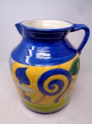 A large glazed pottery jug, height 31 cm.