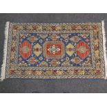 A Caucasian rug of geometric design,