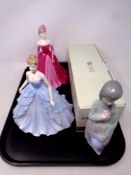 A tray containing Nao figure, Becky, together with two Coalport Ringtons limited edition figures,