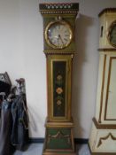 A continental painted longcase clock with circular dial
