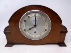 A 1930s oak cased Garrard mantel clock