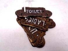 Three cast iron Art Nouveau toilet plaques